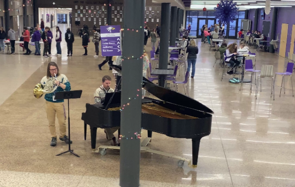 Mr Claussen and Mr. Olson cranking out Christmas tunes the day before break.